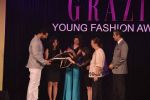 John Abraham Unveiling the Grazia Cover at the _Grazia Young Fashion Awards 2013_.jpg